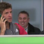 Thomas Müller uses his passport as a phone to dodge questions from the press